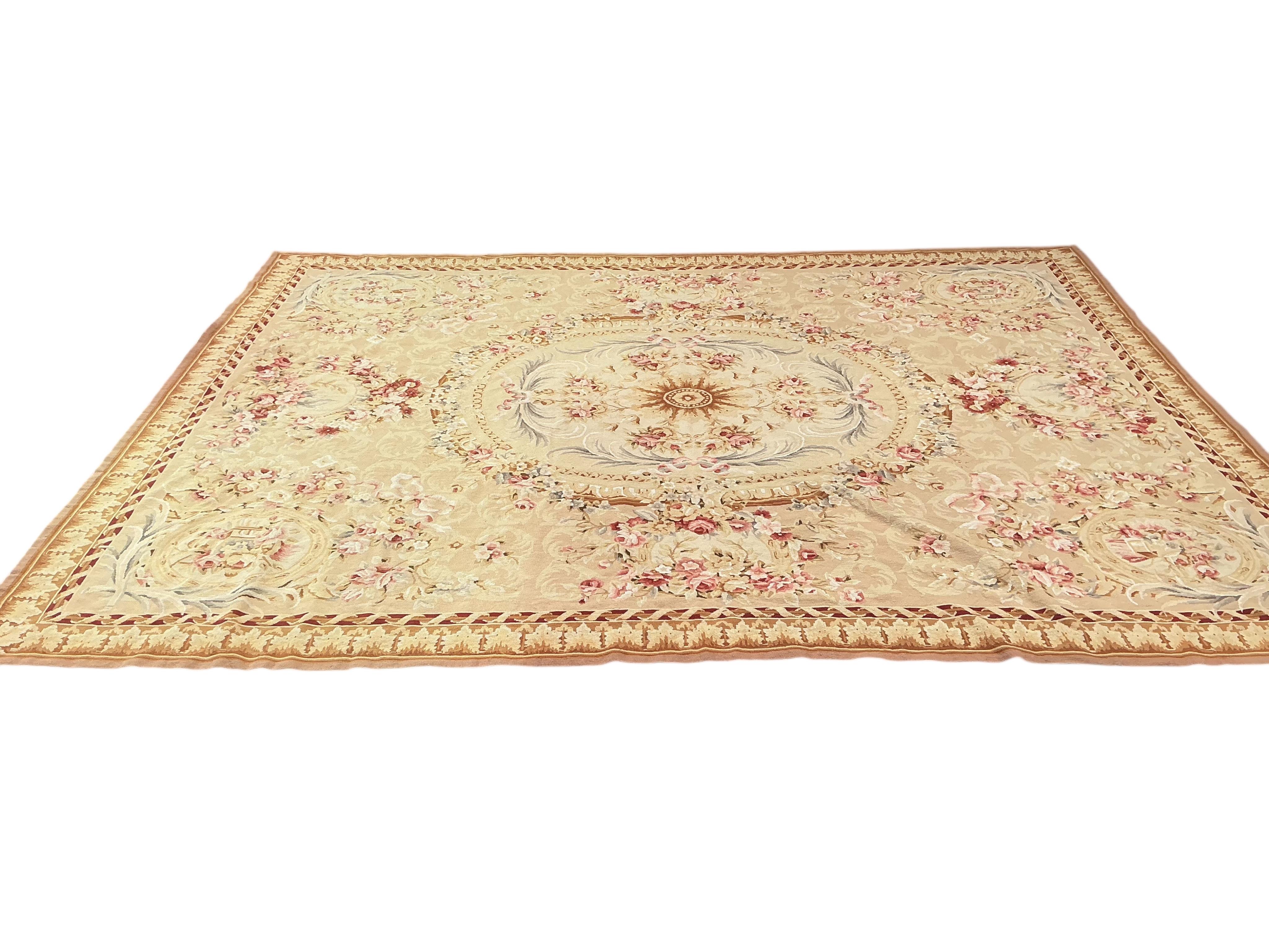 An Aubusson style carpet, 345 x 260cm